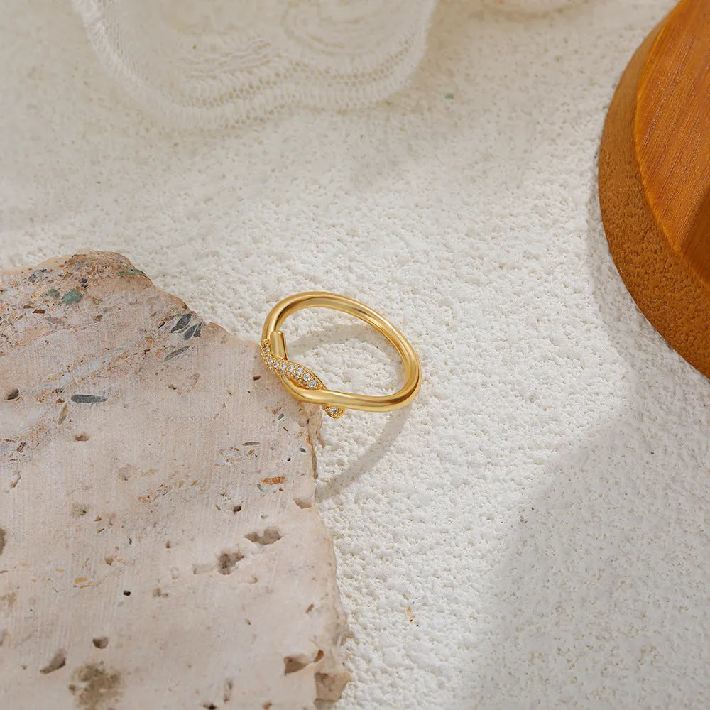 Knotted zircon ring with micro inlaid detail, copper electroplated wave bow design, unisex sizes 6 7 8