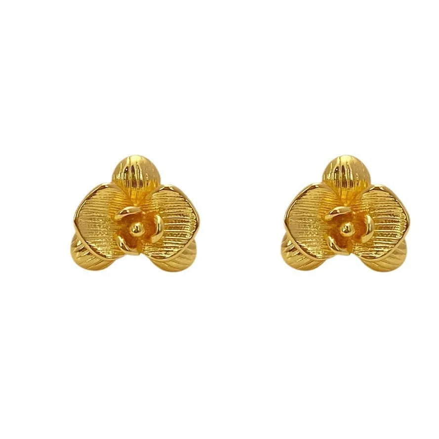 Retro floral earrings for women in gold and silver colours with petal design