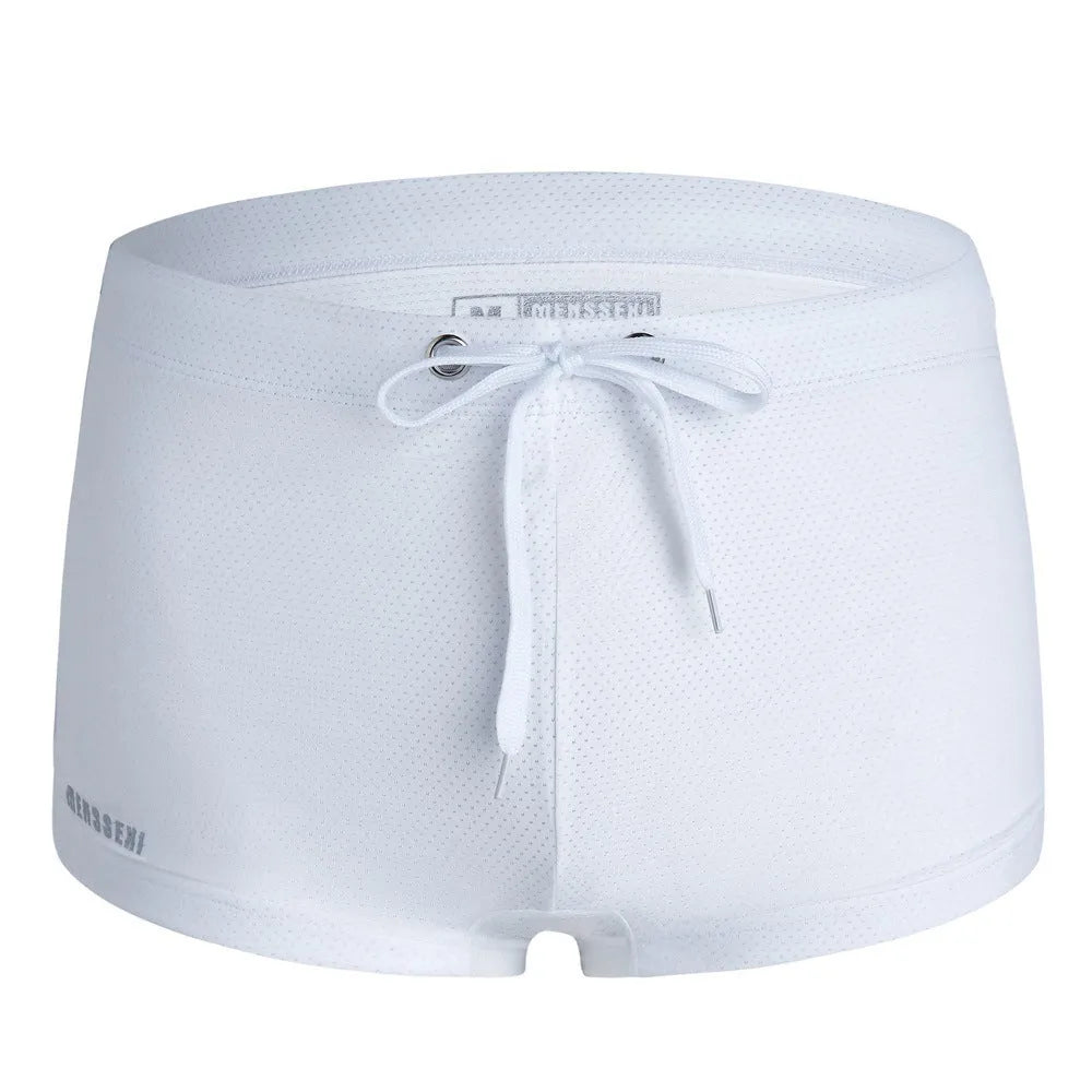 Men's solid colour nylon lace low waist swimming trunks in boxer briefs style.