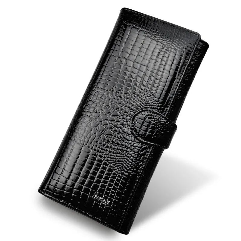 Red women's leather coin purse with a crocodile pattern texture and pigskin lining.