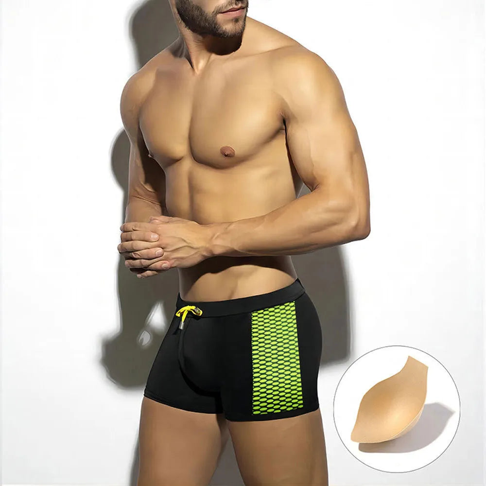 Men's polka dot print quick-dry swimming boxers in black, dark blue, or yellow with ribbon cup detail