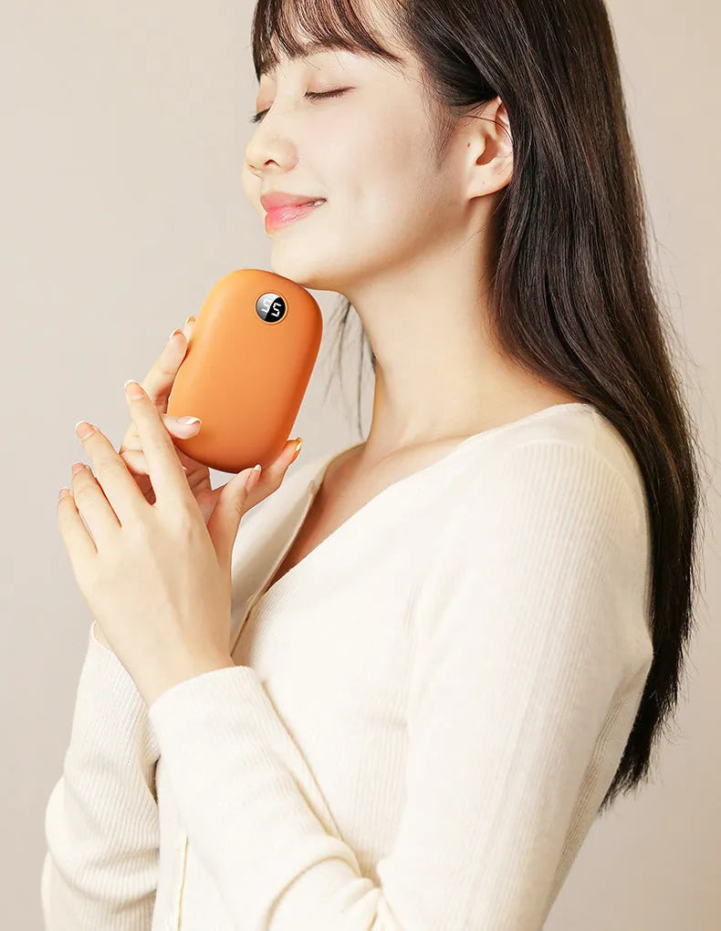 Portable two-in-one hand warmer USB power bank in milky white with three heat settings