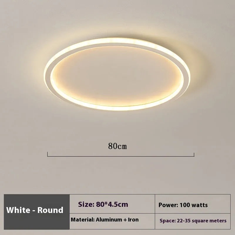 Minimalist circular dimmable LED ceiling lamp in black, gold or white finish.