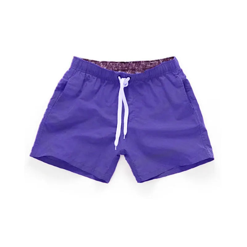 Men's straight leg polyester beach shorts in multiple colours with extended sizing options