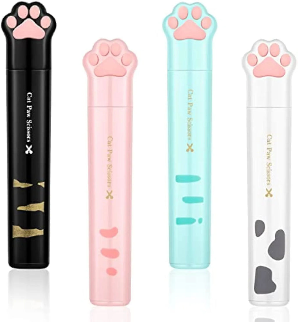 Set of four mini folding scissors with cat paw design in black, blue, pink, and white colours on a plain surface.
