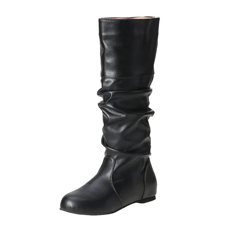 Women's black slip-on knee-high flat boots with a round toe and rubber sole.