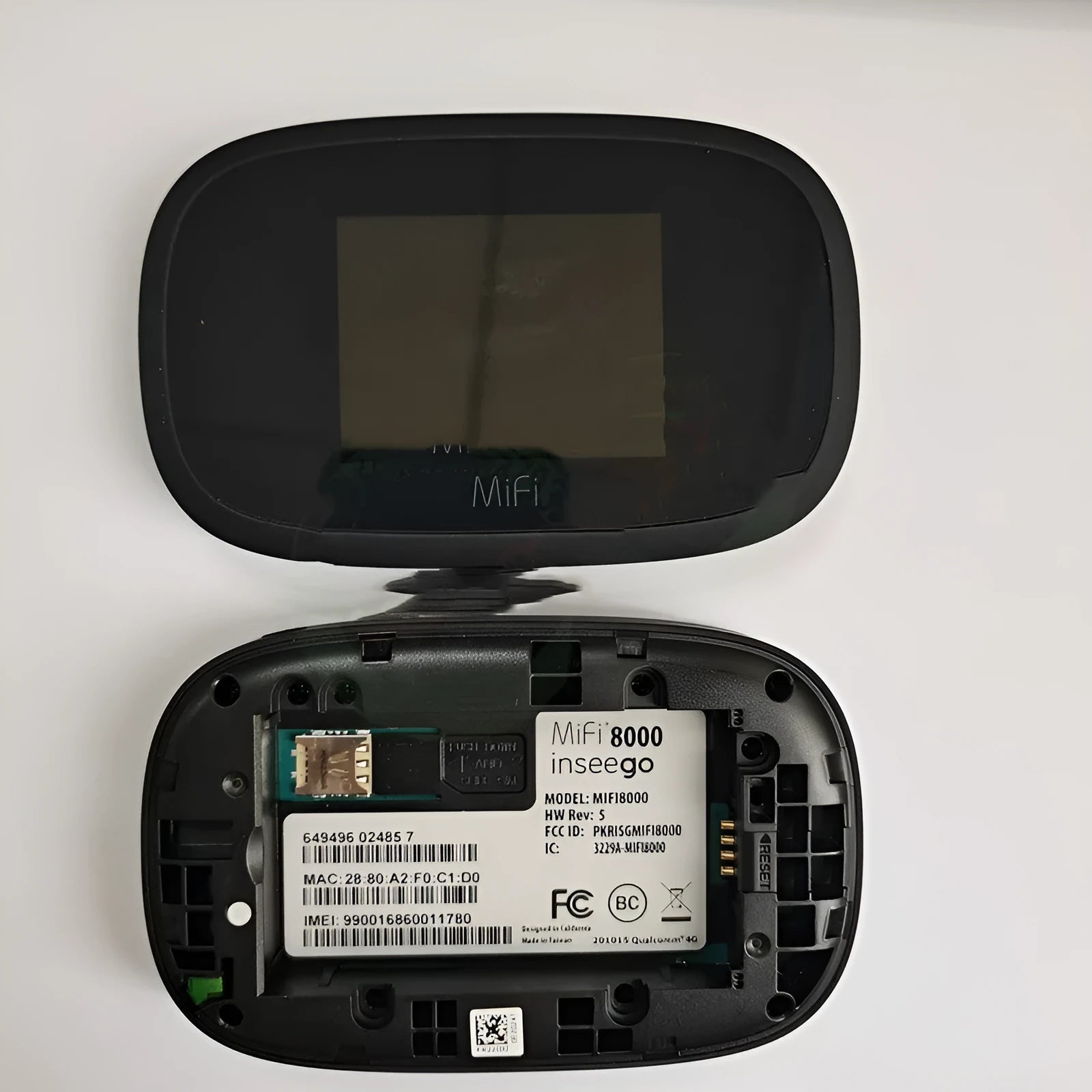 Black portable 4G wireless router showing front display and compact size for mobile internet