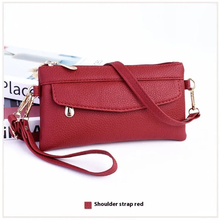 Soft PU leather crossbody bag in a square shape showing the internal sandwich zipper pocket.