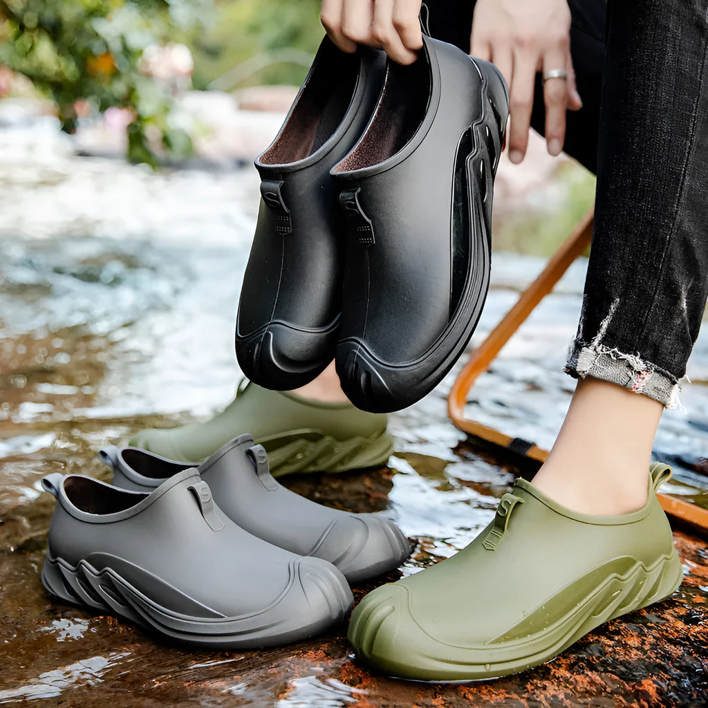 Men's short solid colour rain boots in plastic construction available in multiple colours