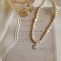 Adjustable French court vintage pearl necklace with geometric design on alloy chain
