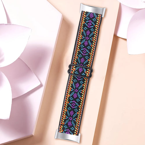Printed elastic replacement watch strap for Fitbit Charge 6 in assorted colours on a white background