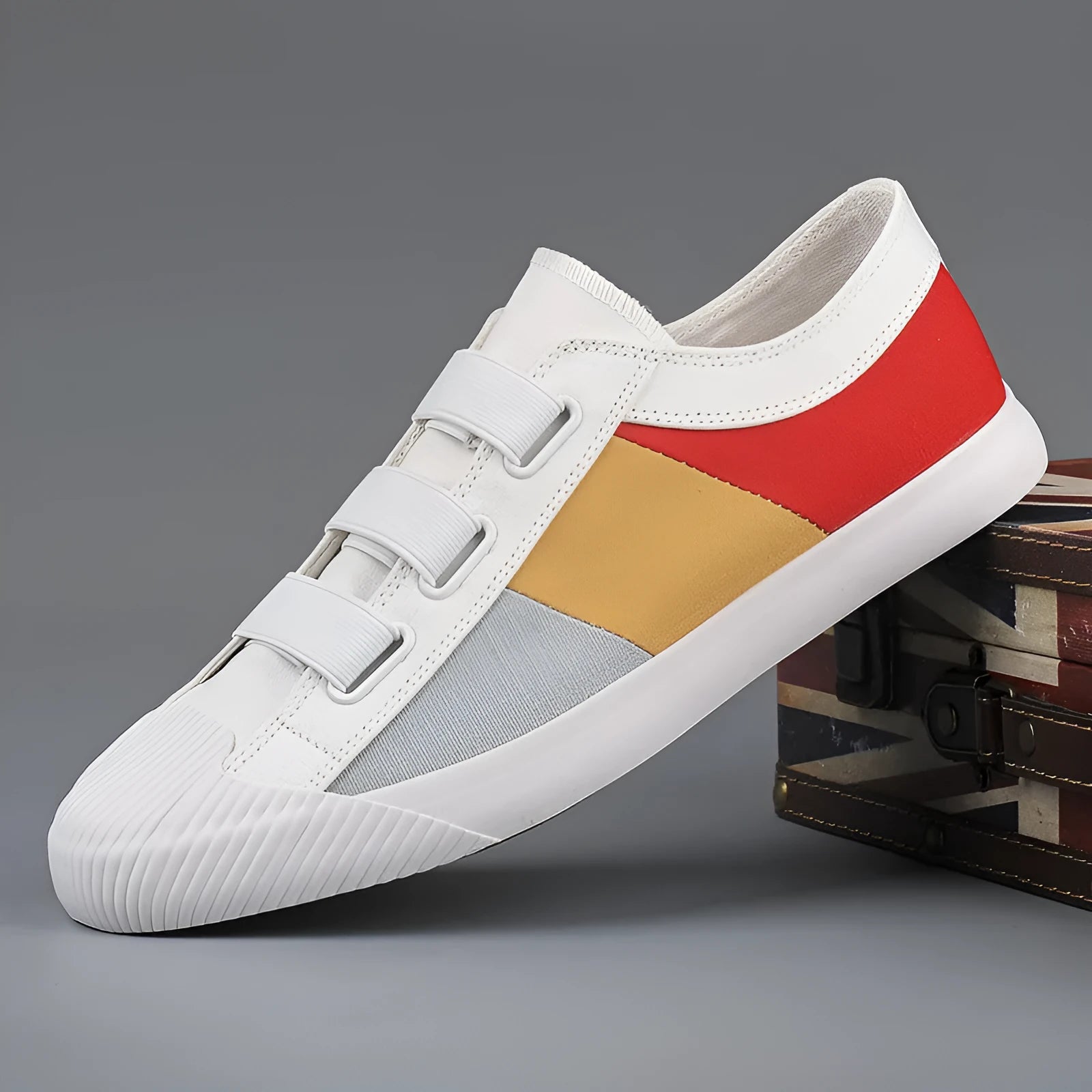 Men's canvas sneakers with rubber sole in multiple colour options showing low top design and elastic band