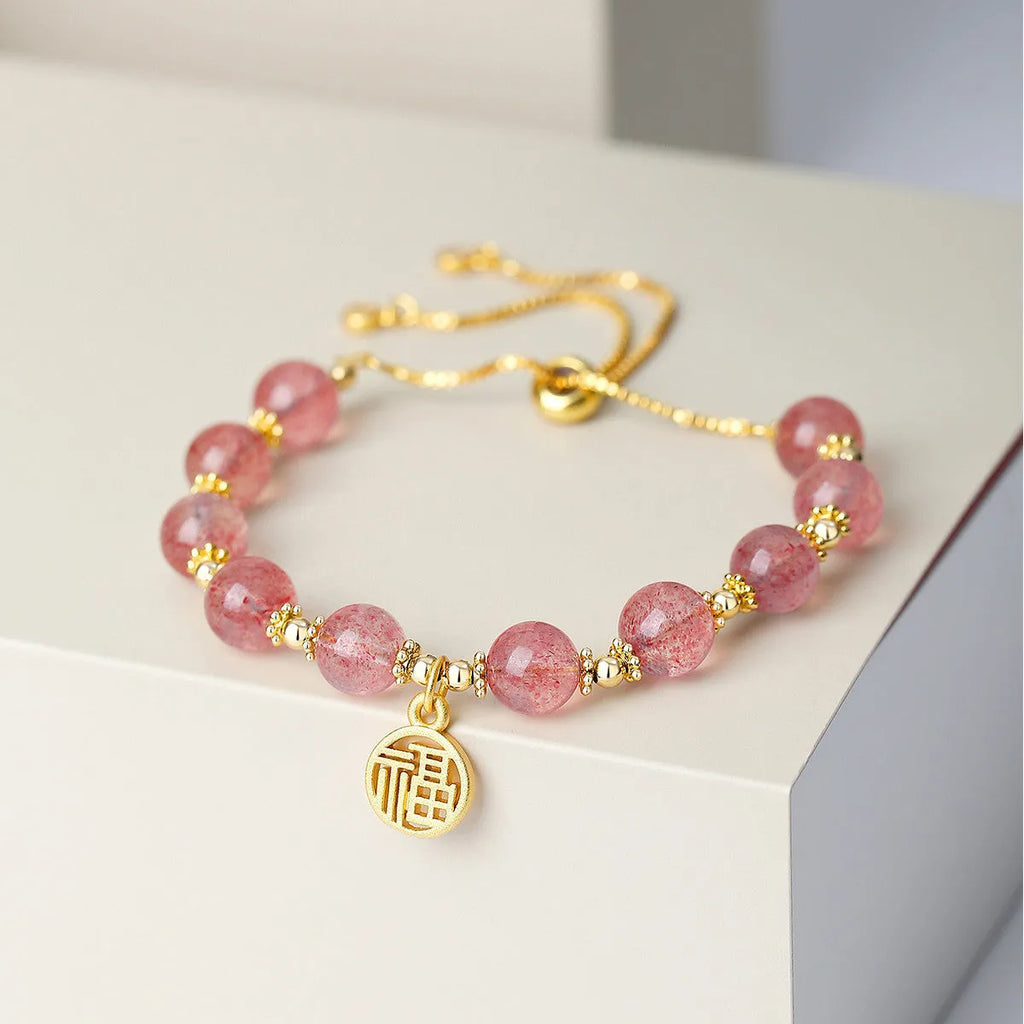 Women's strawberry quartz crystal bracelet with geometric shape and silver fu character design
