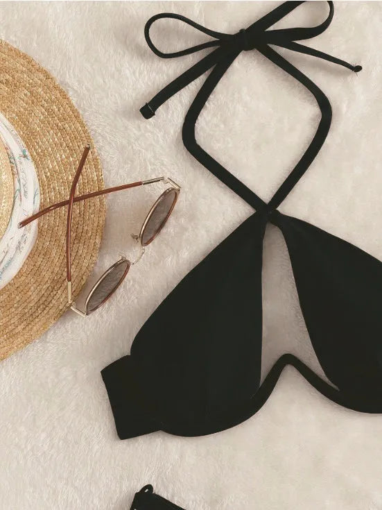 Women's halter neck bikini swimsuit in black blue or brown solid colours with briefs style