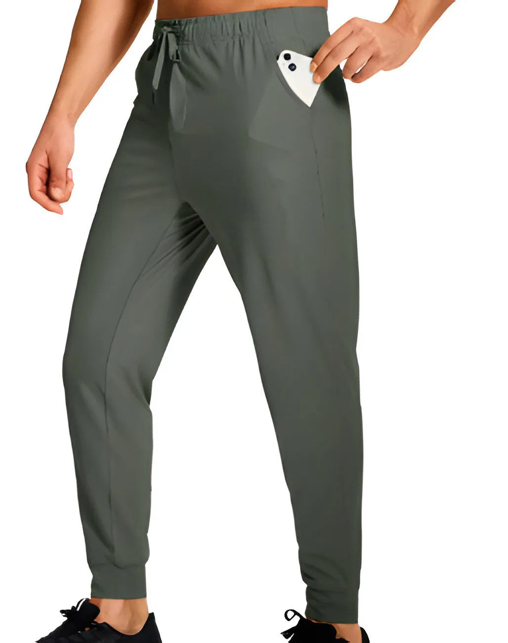 Men's loose fit casual trousers in solid colour polyester fabric showing relaxed cut and casual styling