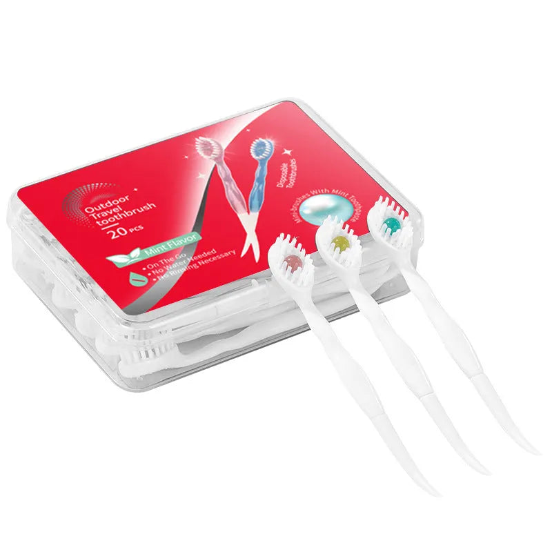 Box of 20 disposable beaded travel toothbrushes in individual wrappers.