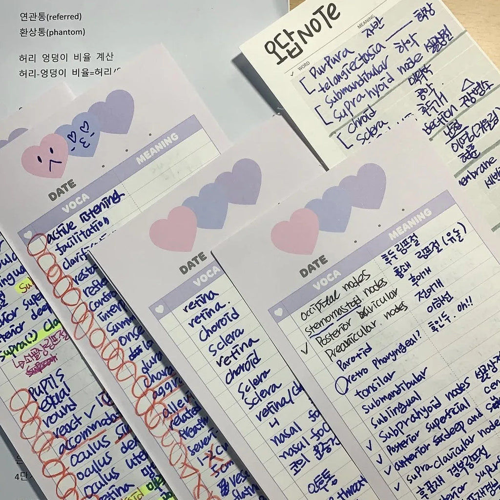 Vertical English word notepad in blue, pink, or purple cover, showing double-sided printed pages.