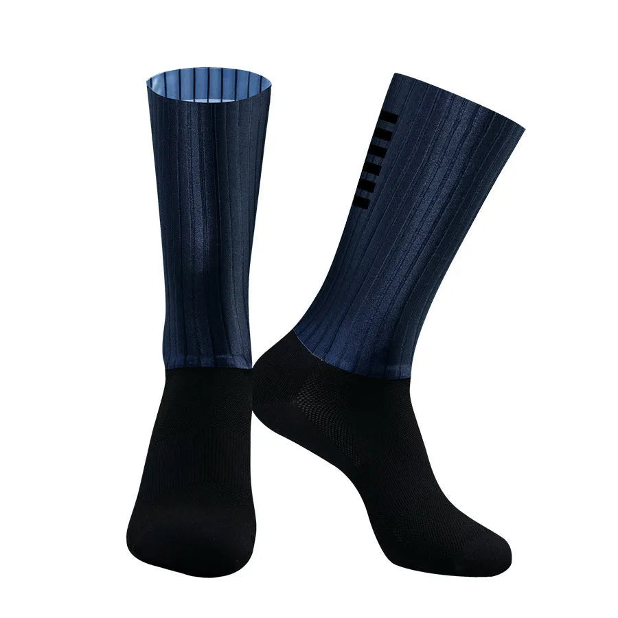 A pair of athletic cycling socks in a chemical fibre blend, shown in one of six available colours on a plain background.