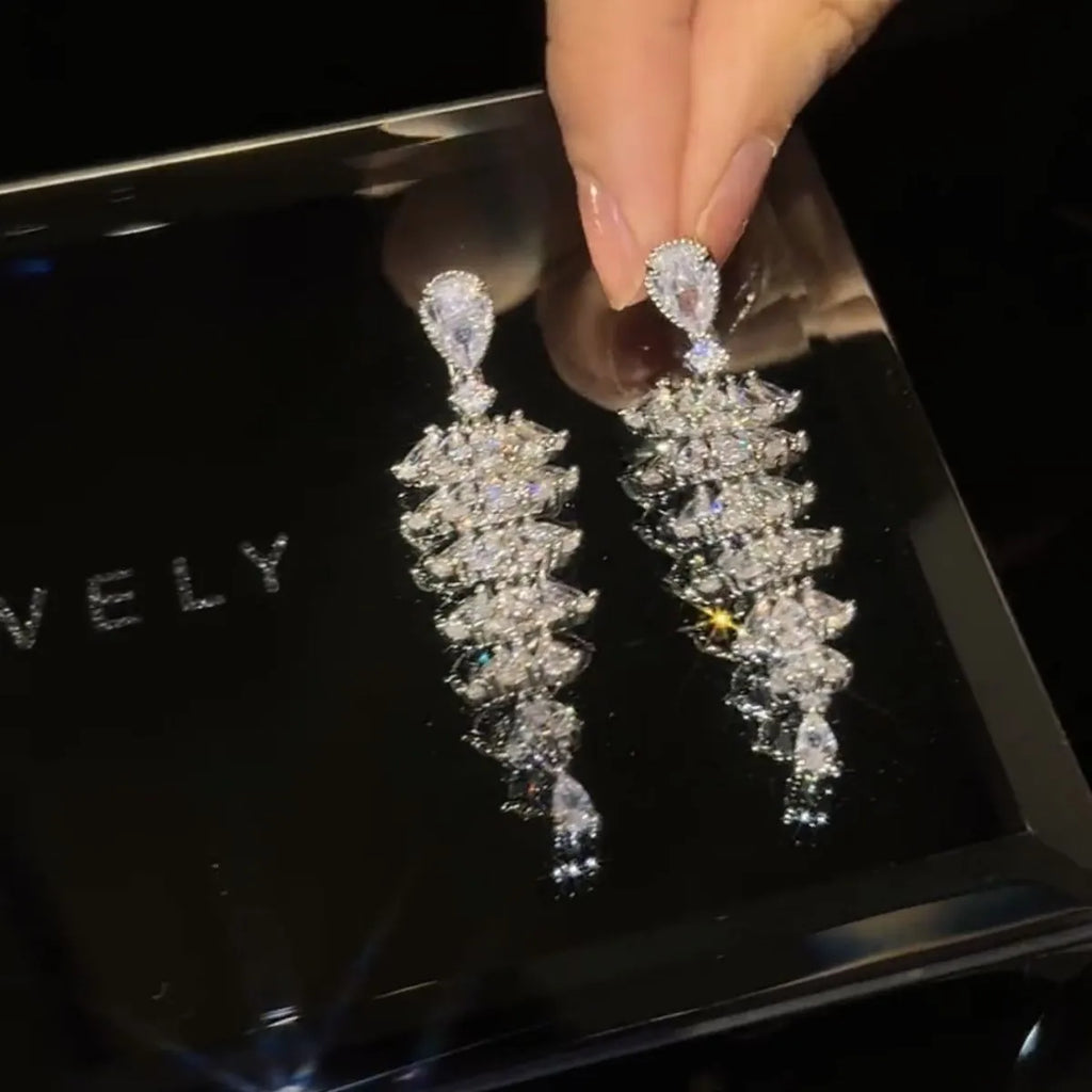 Christmas tree drop earrings with zircon stones in silver pagoda colour