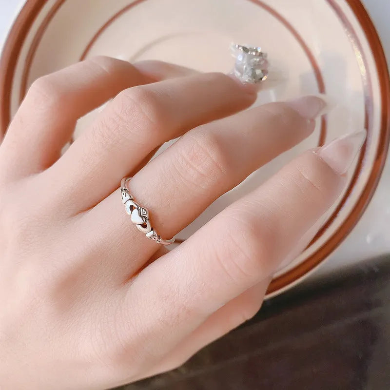 Retro silver heart-shaped open ring for women made from copper.