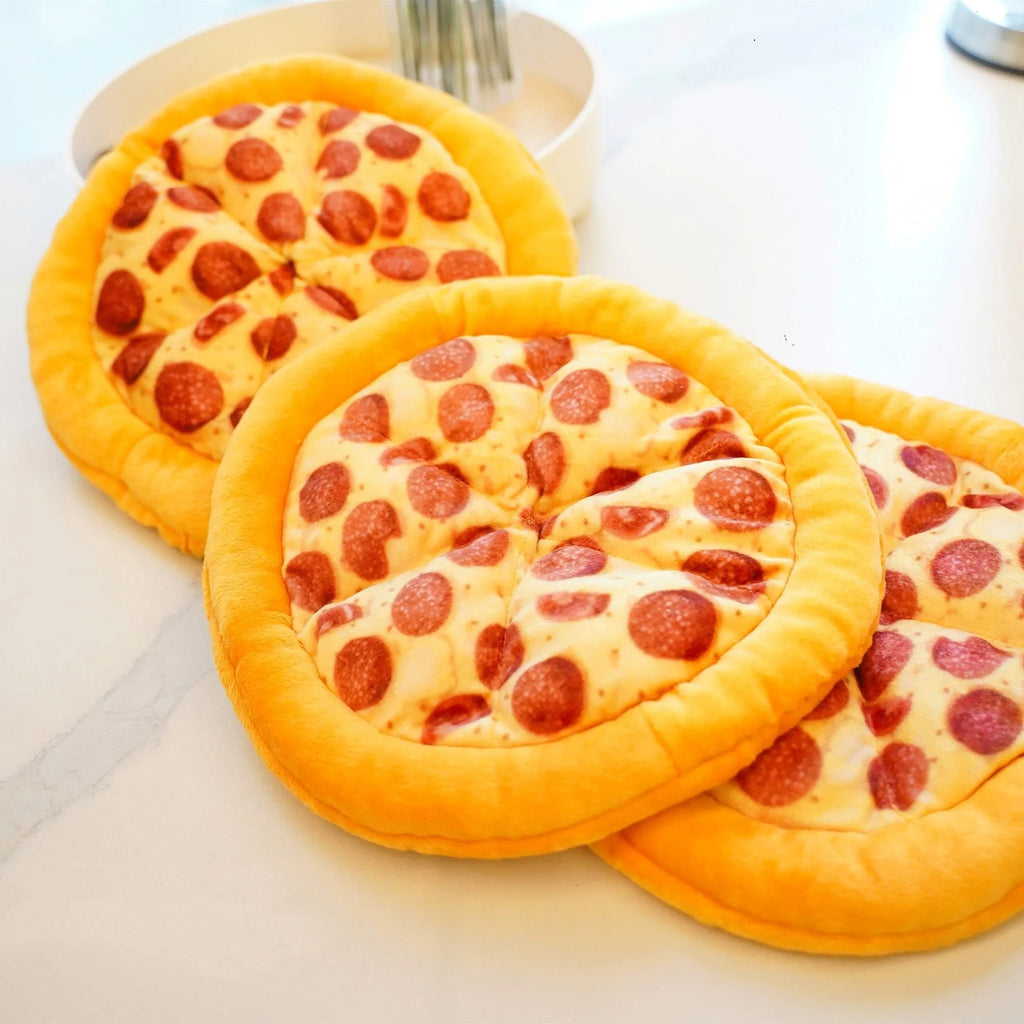 Yellow pizza-themed plush dog toy with squeaker for chewing and interactive play