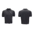Man modelling a slim-fit black knitted polo shirt with an oblique zip closure and short sleeves.