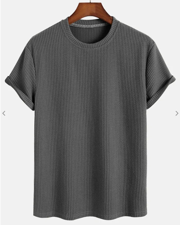 Men's solid colour loose round neck T-shirt in chemical fibre blend, available in black and other colours, sizes S to XL