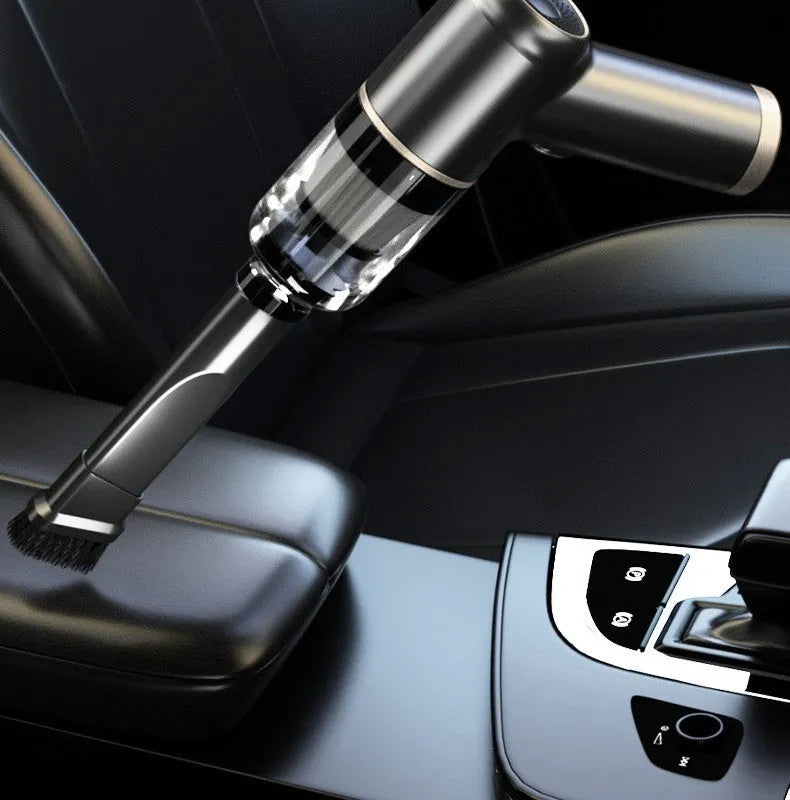 Black cordless car and home vacuum cleaner with inflation function and full accessory kit on a white background.