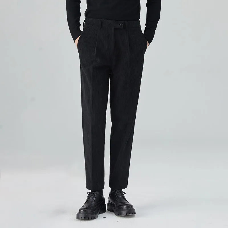 Men's straight-leg corduroy trousers in a loose fit, shown in beige colour.