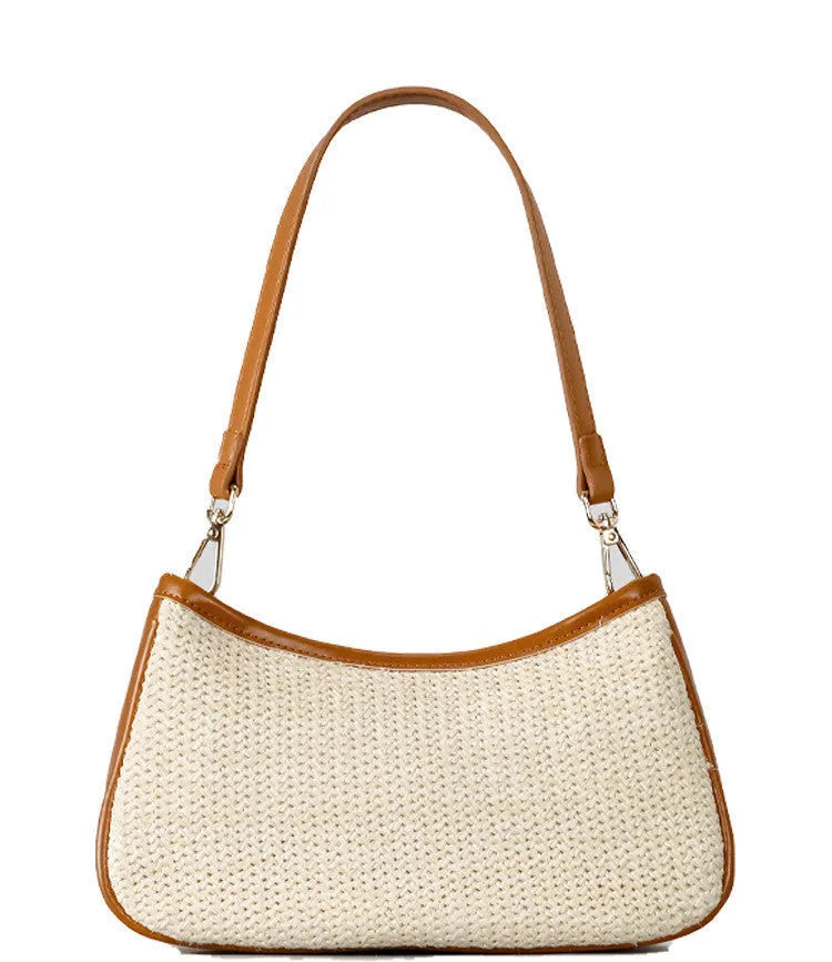 Khaki coloured hand-woven straw selenodon crossbody bag with a single shoulder strap