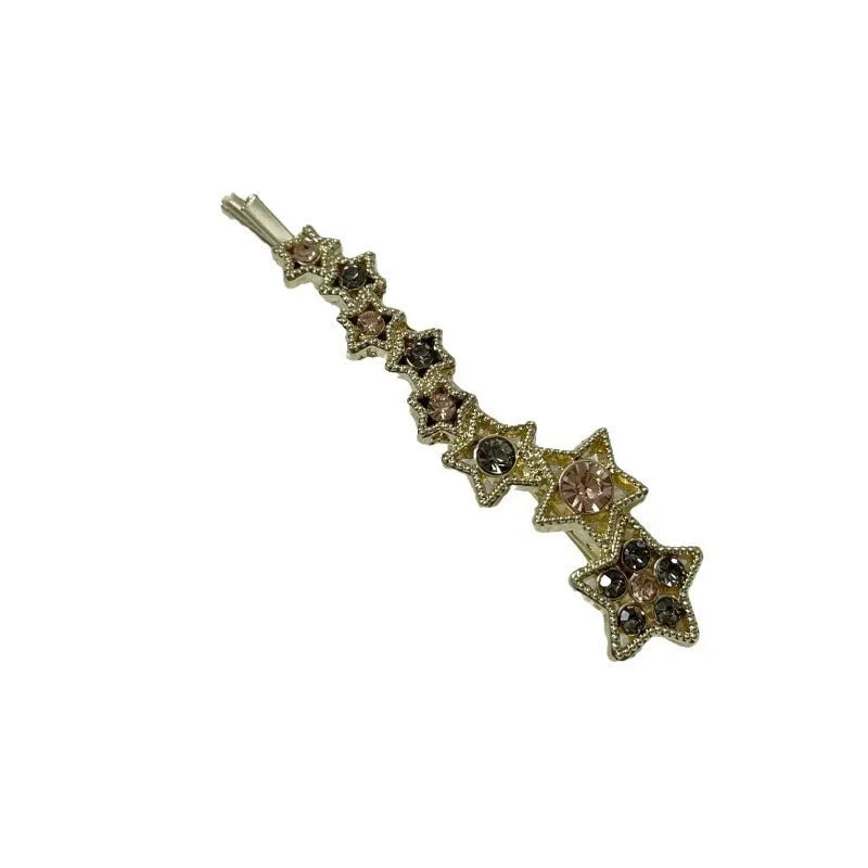Gold electroplated alloy hair barrette with side clip and five-pointed star charm decoration
