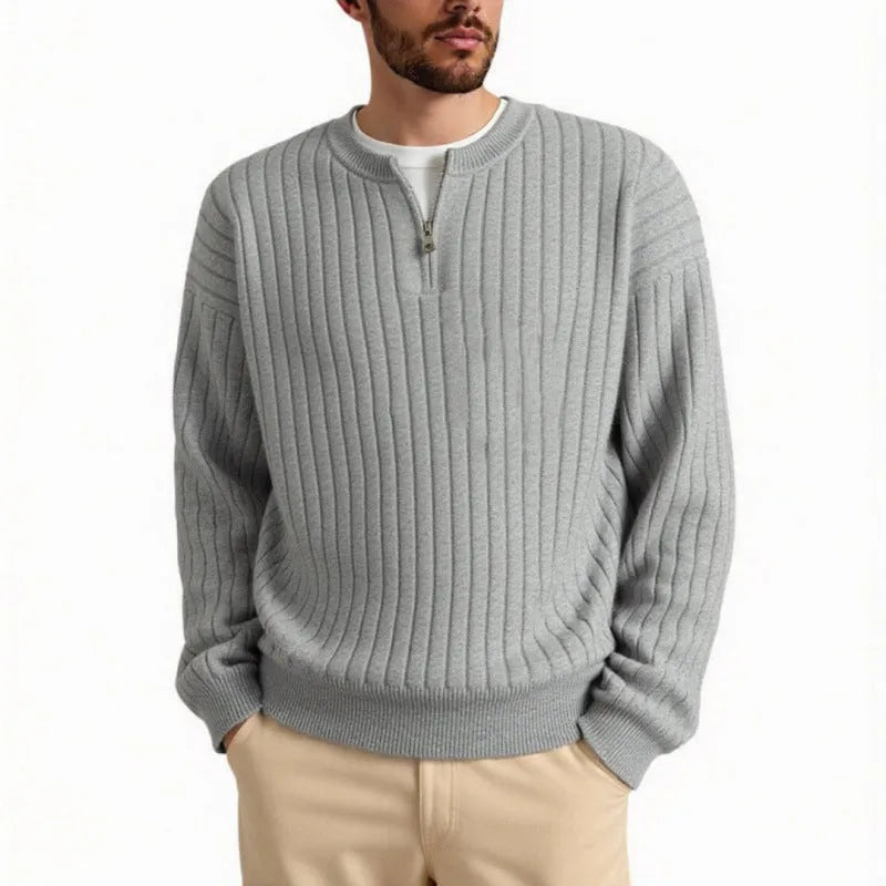 Grey men's loose fit half zip pullover sweater with textured knit and long sleeves.