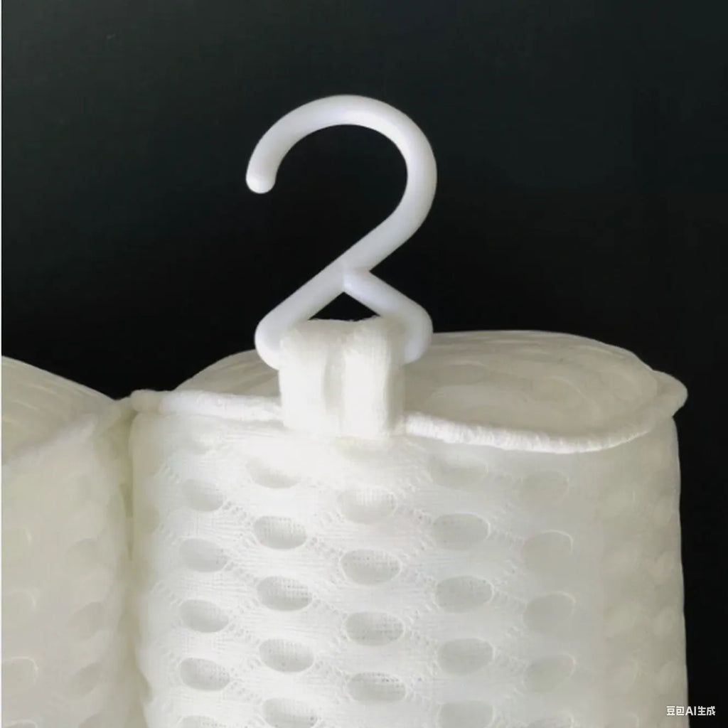 White bathtub pillow with 4D mesh and 7 suction cups on a bathtub.