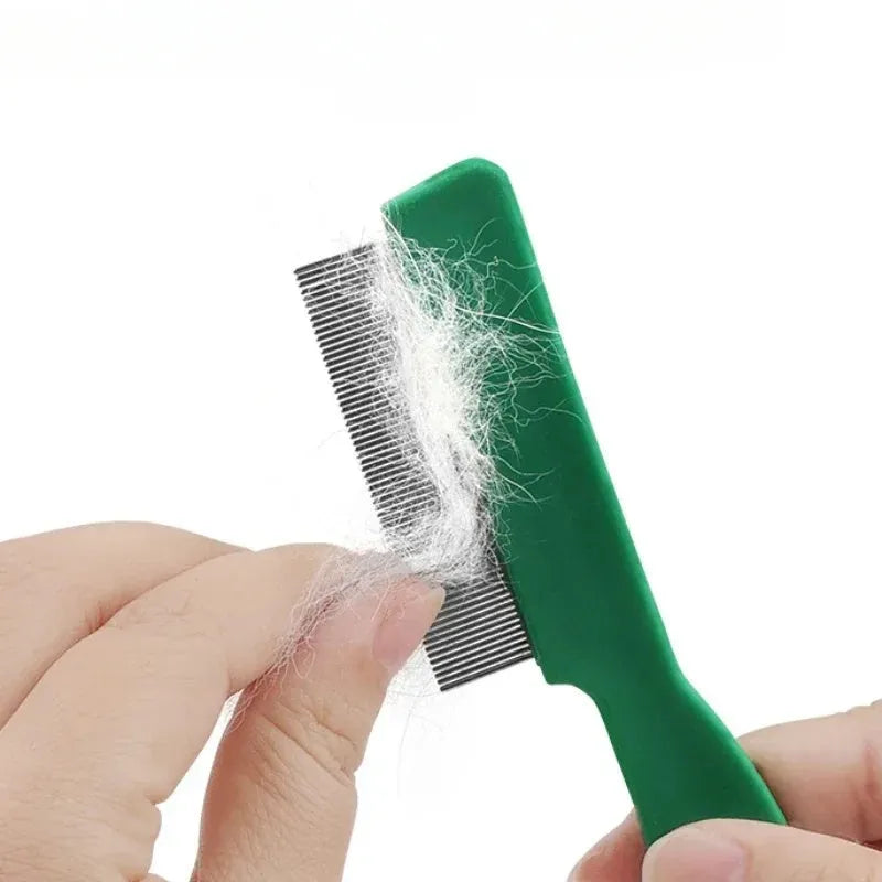 Green plastic handle stainless steel pin pet flea comb for dogs and cats on a white background.