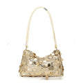 Women's soft polyester underarm crossbody bag in gold colour showing sandwich pocket design and single strap