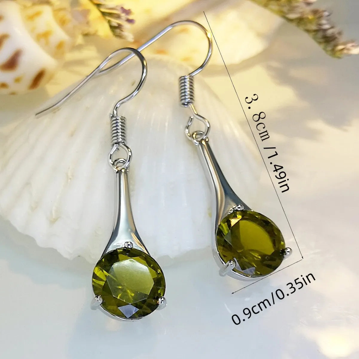 Olive green topaz drop earrings with water drop shape and retro style design