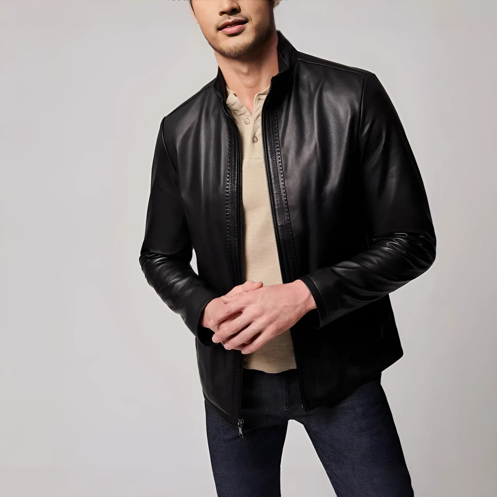 Black men's retro leather jacket with long sleeves and straight hem on a hanger