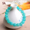 Natural Grade 7A Amazonite scattered beads in ice colour, showing polished surfaces and multiple size options for jewellery making.