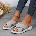 Black romantic style women's wedge slippers with cross strap and thick rubber sole