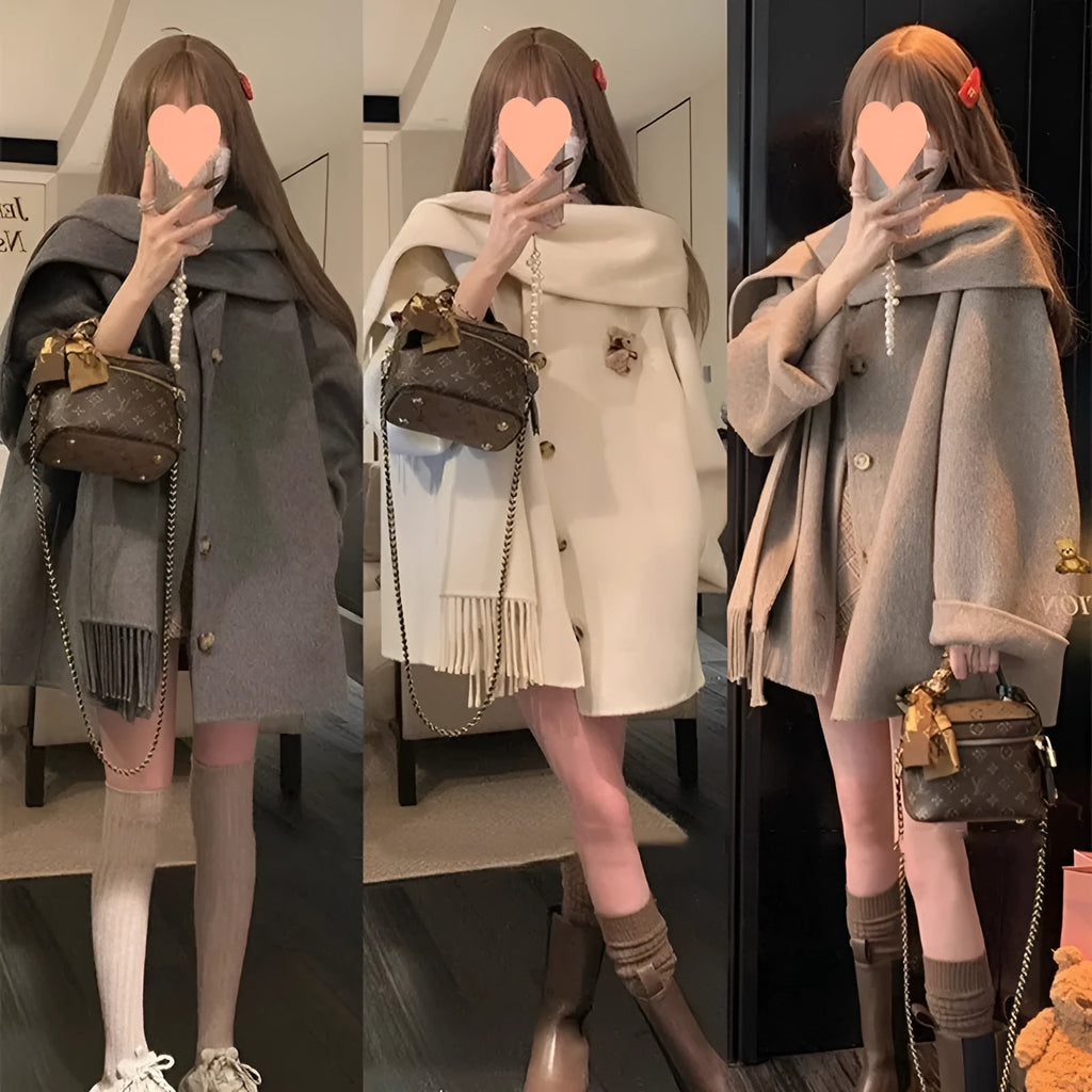 Gold Cloak loose-fitting tassel woolen coat in cream white on a female model