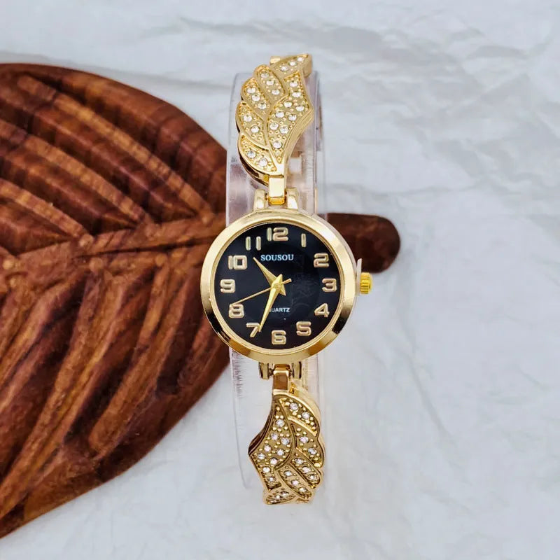 Women's stainless steel watch with round dial, available in gold, golden white, or golden black surface options