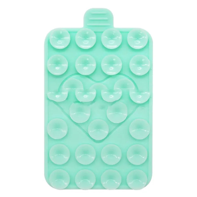 Double sided silicone suction cup phone case holder in gray white, showing hot pressed construction for universal fit on smooth surfaces