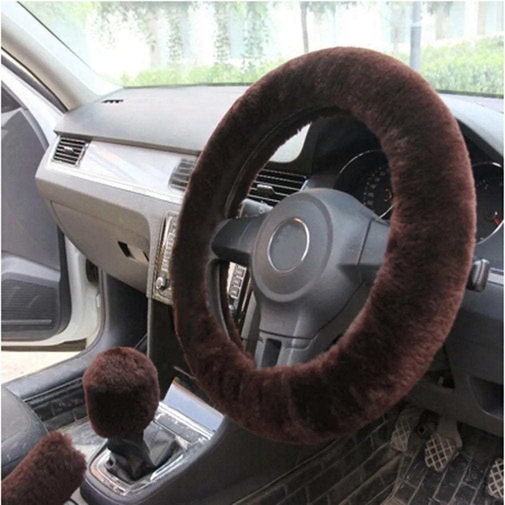 Plush car steering wheel cover set with brake handle and gear shift covers in six colour options.
