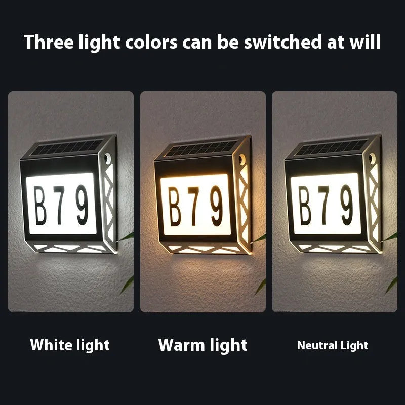 Solar powered waterproof doorplate light with LED address digits in black housing
