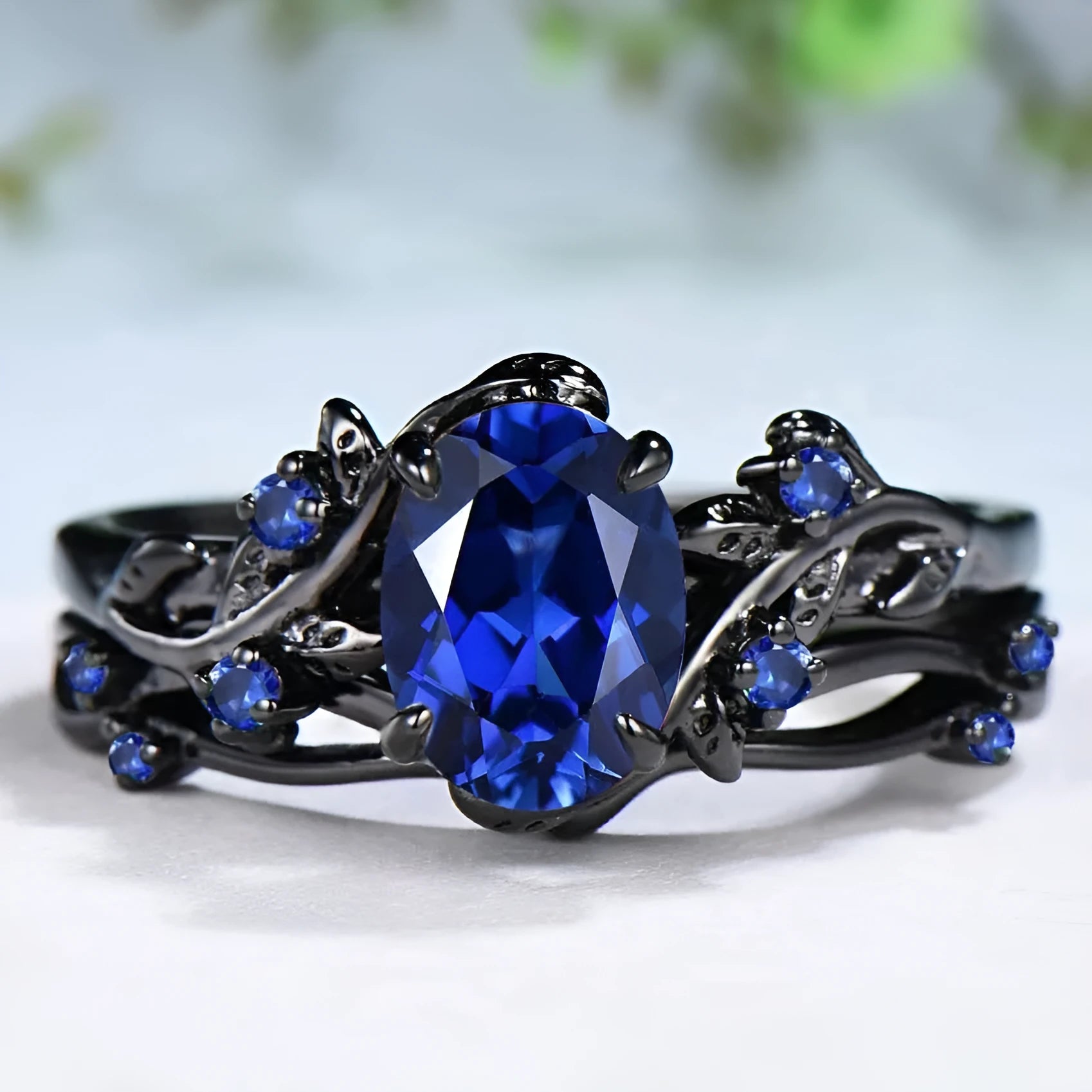 Women's gun black geometric ring with navy blue rhinestone decoration on copper base