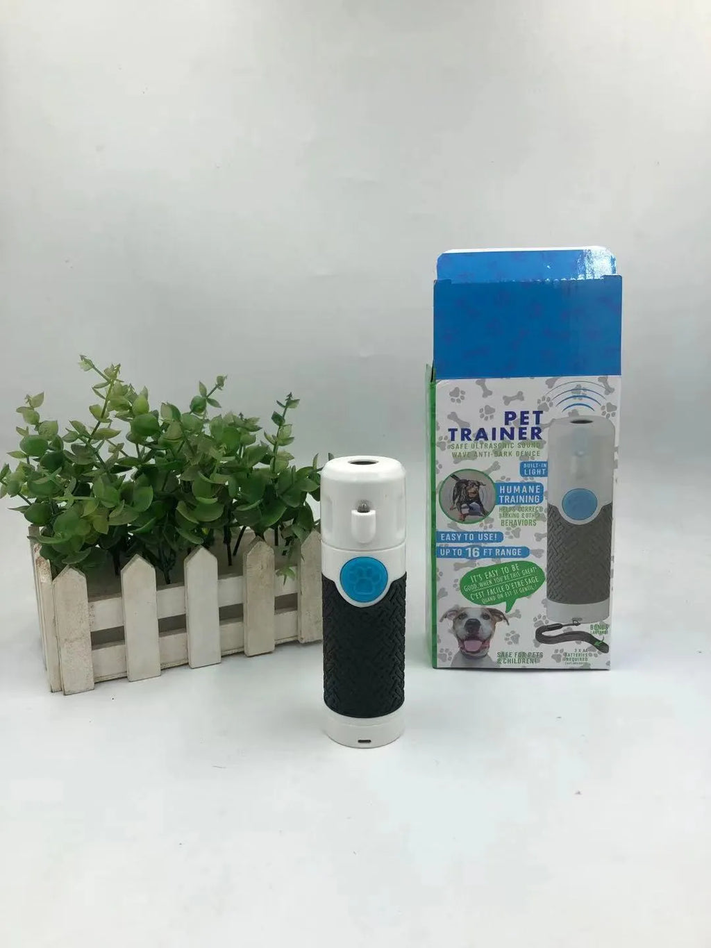 White ABS plastic handheld ultrasonic dog trainer for bark control training