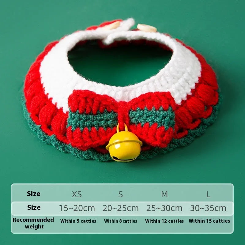 Hand-woven red and white Christmas bow knit collar scarf for a cat on a festive background.