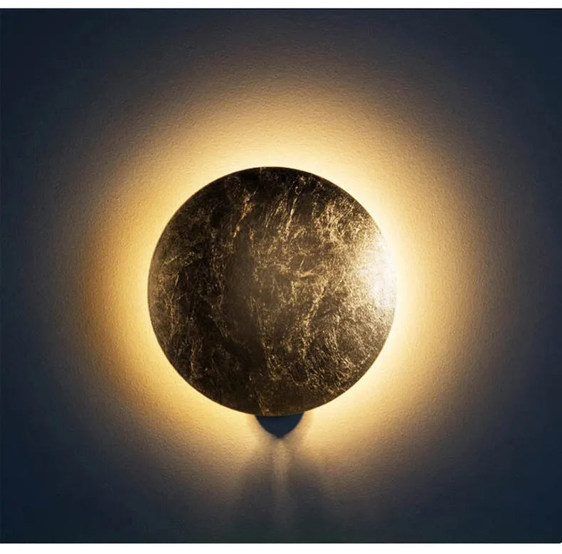 Modern minimalist aluminium bedside lamp in golden or black and gold finish, 20cm or 25cm diameter options