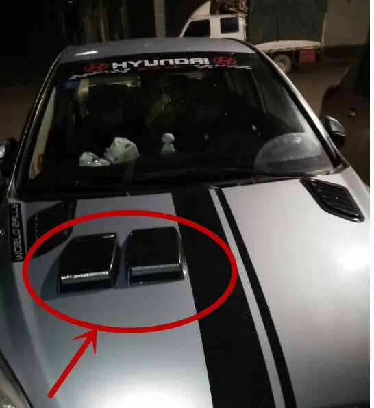 Decorative car air vent grille in ABS plastic shown in black, white, and silver colour options.