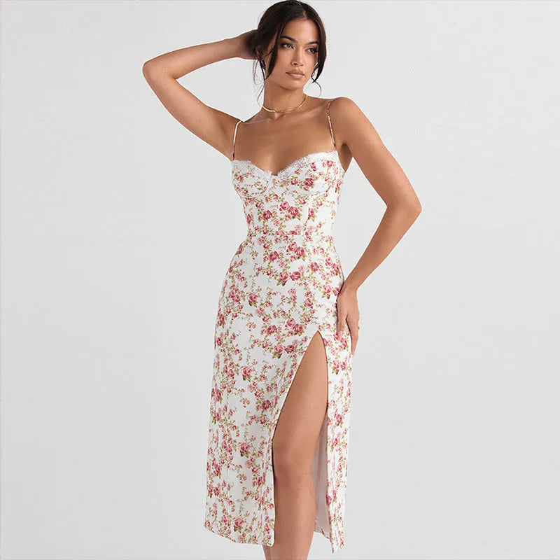 Blue women's long dress with white lace flower print, side slit, and thin suspender straps.